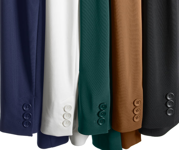 Different colors of a blazer sleeve: navy, white, emerald, camel, and black.