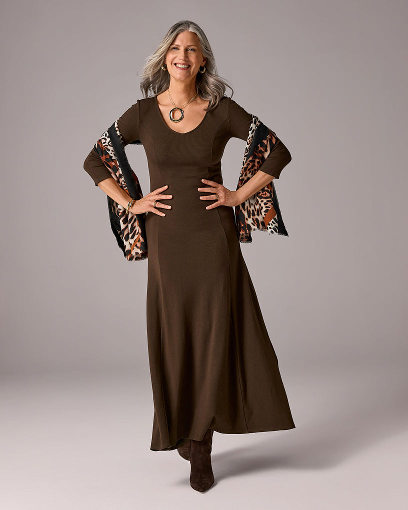 model wears brown maxi dress