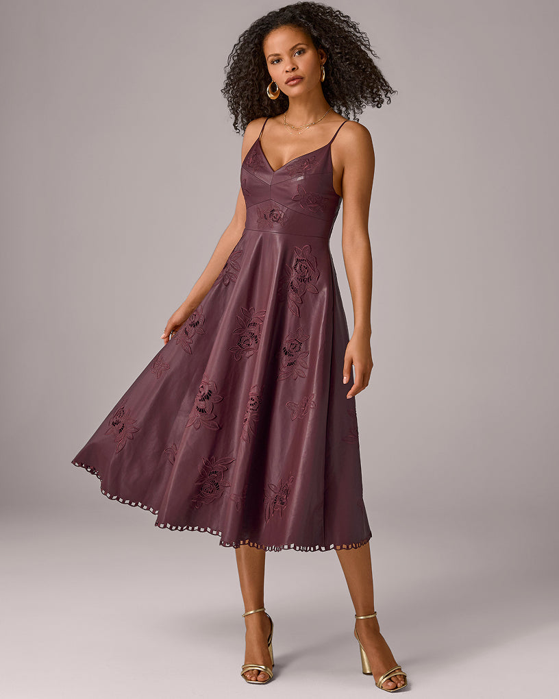 model wears burgundy midi dress