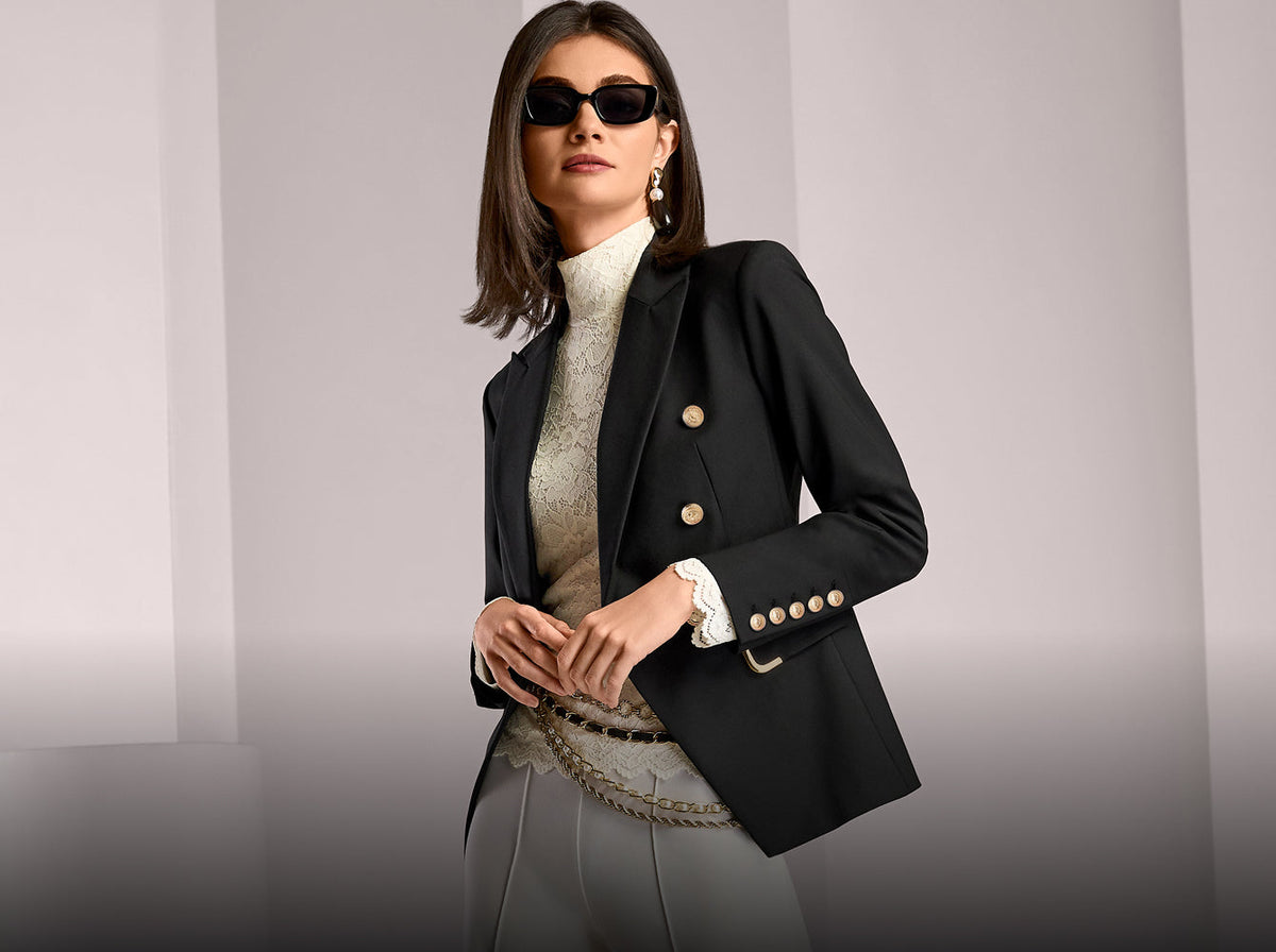 model wears black blazer