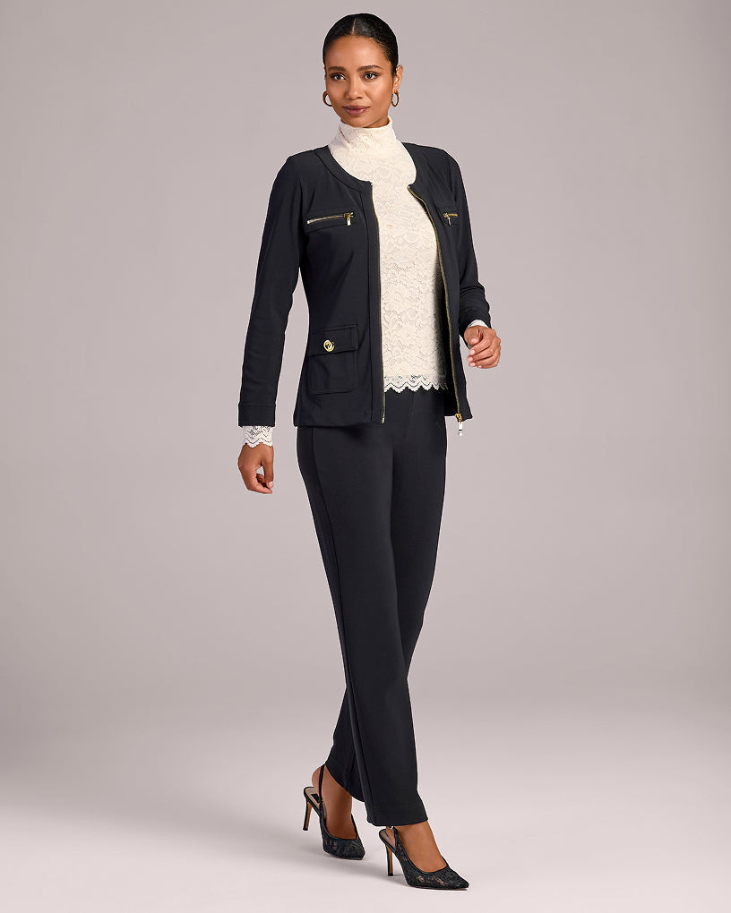 model wears black travel set