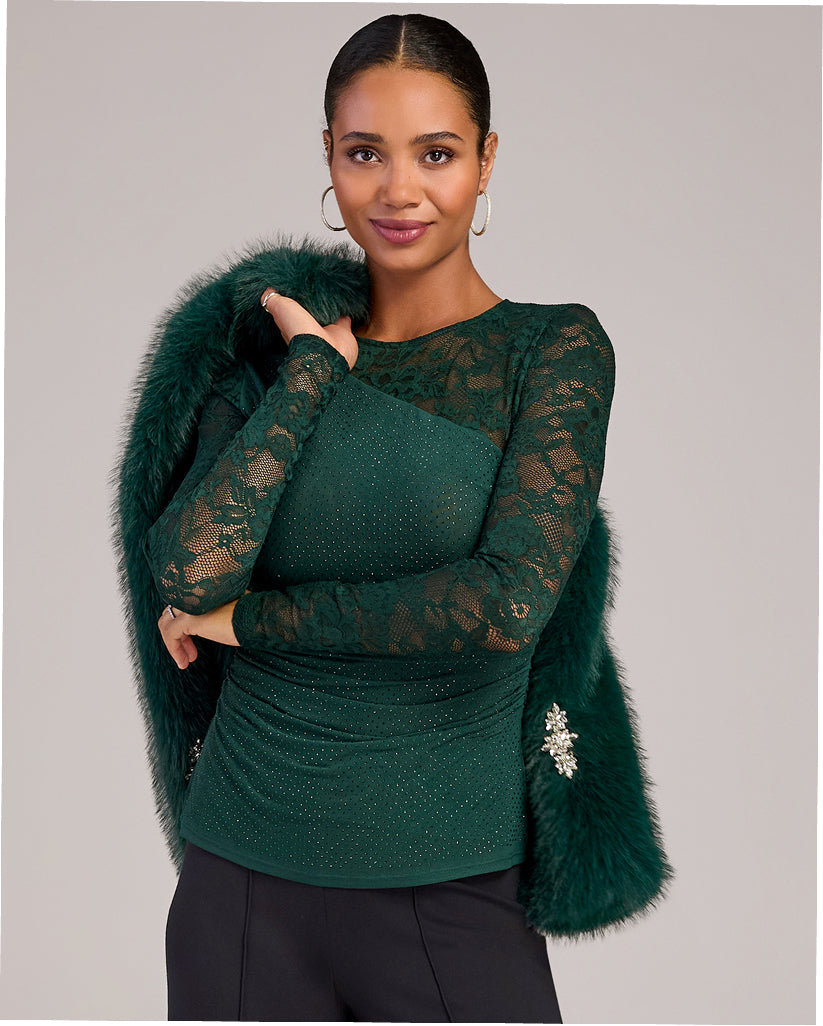 model wears dark green lace top