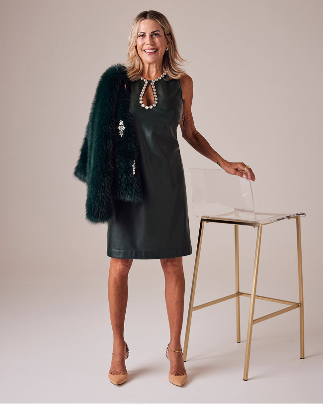 sheryl wears green dress