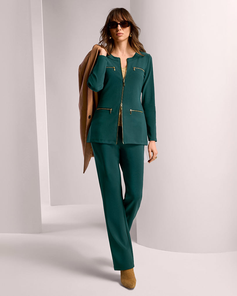 model wears green matching travel set