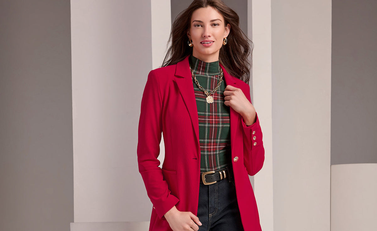 model wears red travel blazer