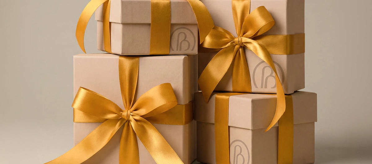 gift boxes with gold ribbon