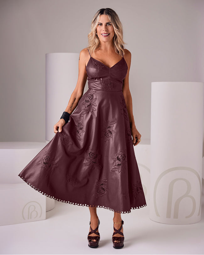 sheryl wears burgundy dress