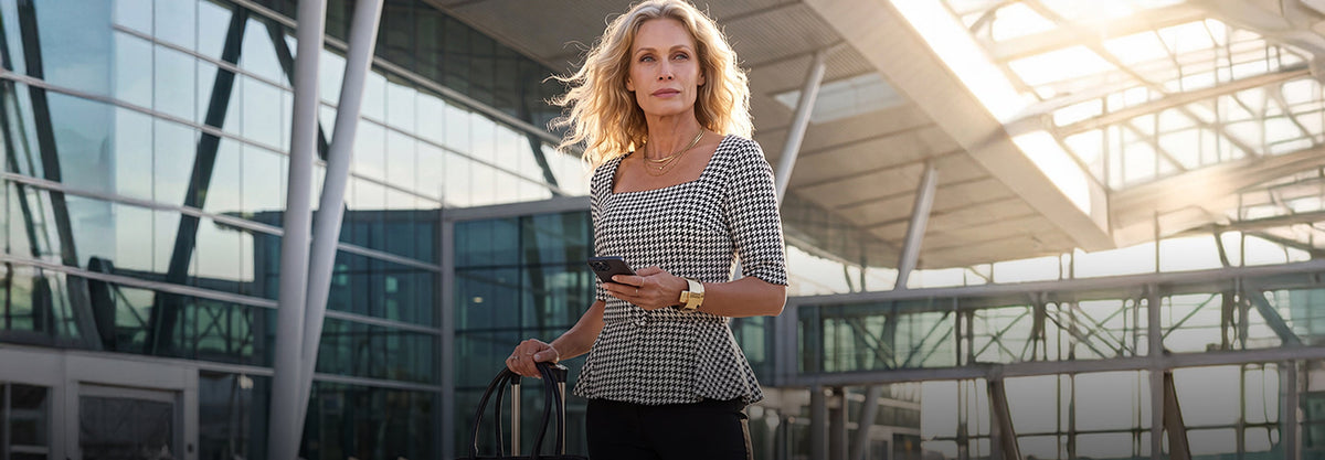 models wearing houndstooth peplum top