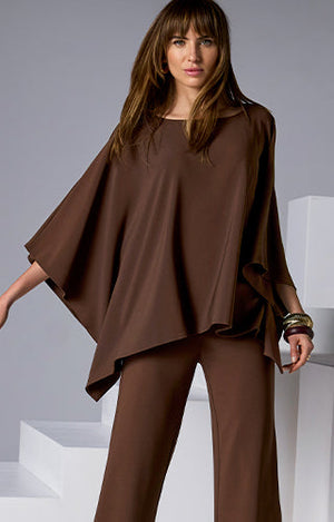 models wearing brown poncho style top with matching pants