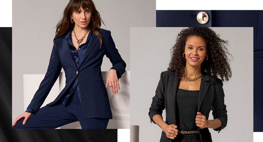Two women modeling tailored blazers and pants in dark navy and black, shown side by side against a light gray studio background with decorative dark corner panels.