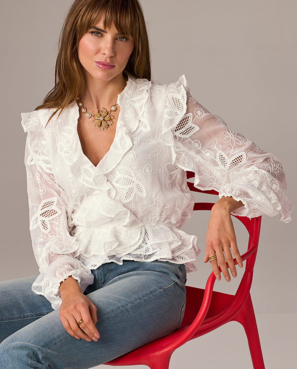 models wearing white ruffle top