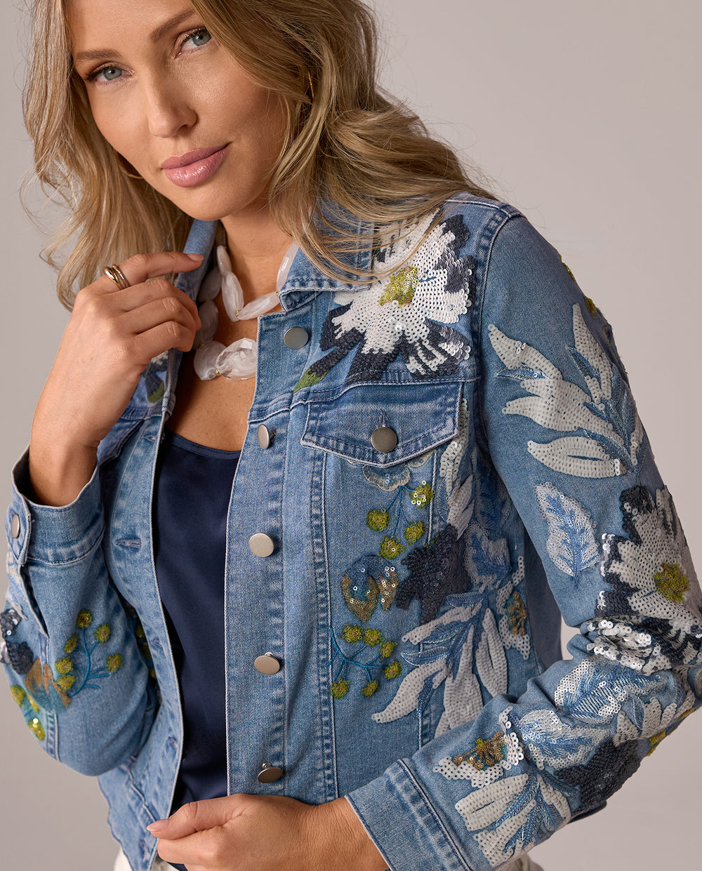 models wearing floral embroidered denim jacket