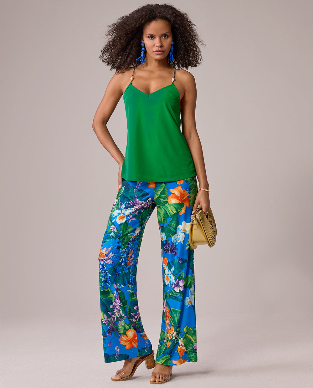models wearing tropical print pants