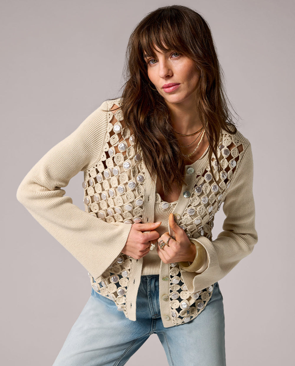 models wearing tan cardigan