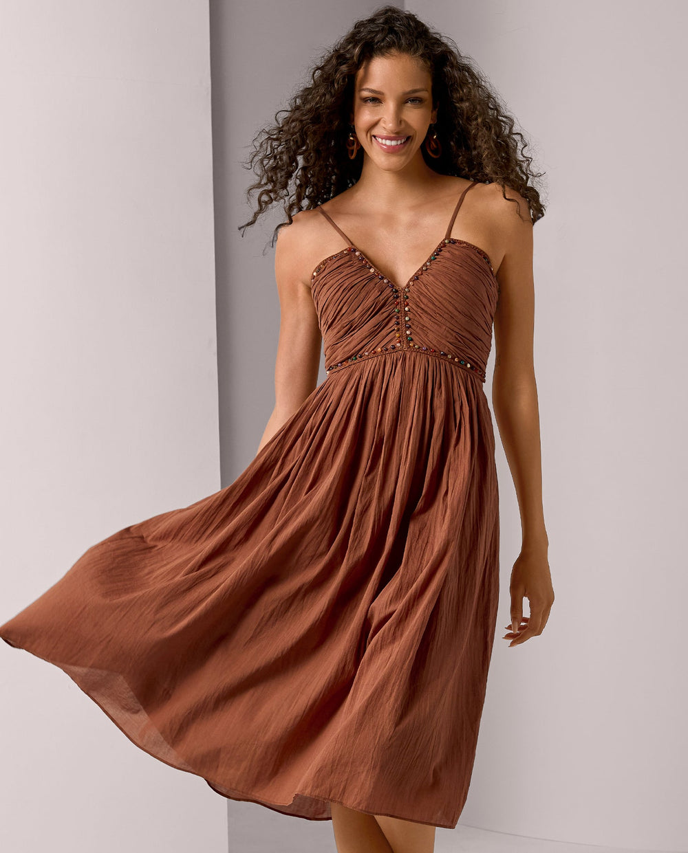models wearing rust dress