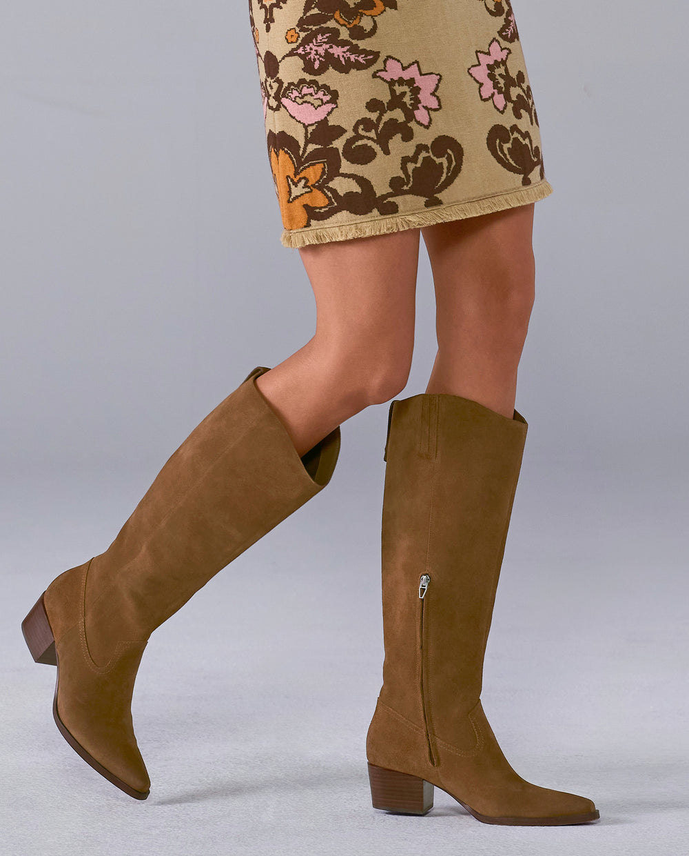 models wearing brown heeled boots