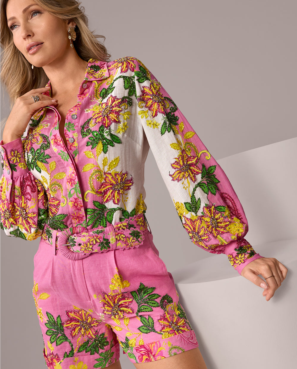 models wearing green and pink floral matching set