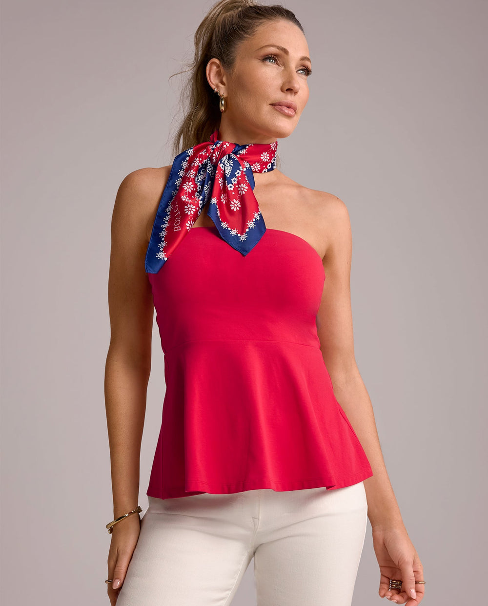 models wearing red tube top with red, white, and blue scarf