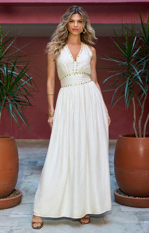 Models wearing white and gold embellished maxi dress.