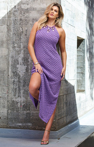Models wearing a purple crochet and embellished halter dress.