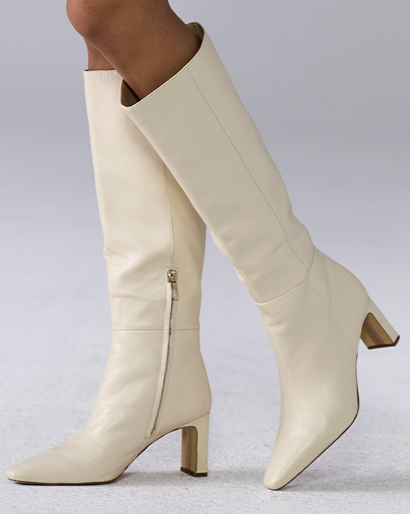 models wearing white boots