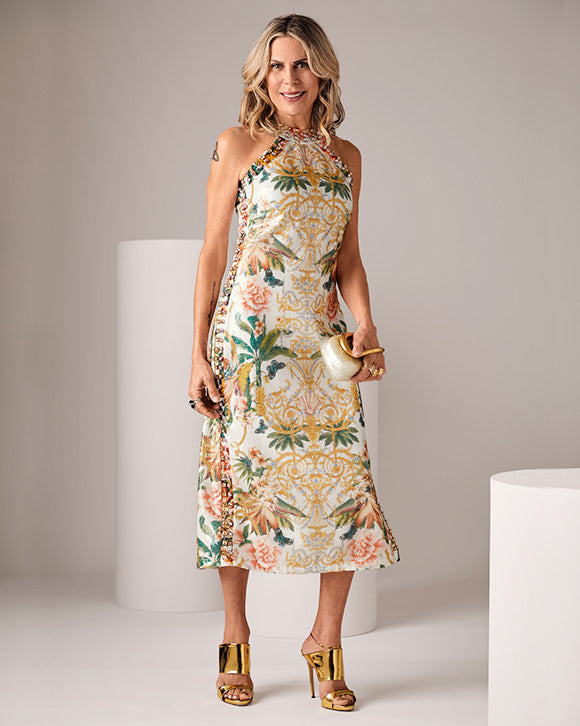 Sheryl wears tropical jeweled halter top dress