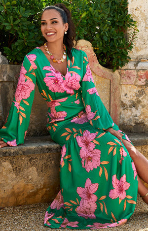 Models wearing green and pink floral long sleeve gown,